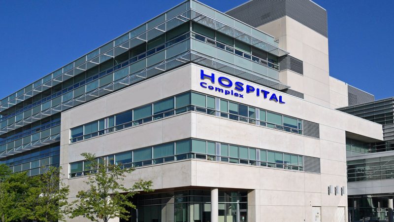 Exterior of a hospital complex that buys medical devices through distributors and direct sales teams